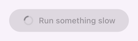 A button showing its loading spinner while the action runs